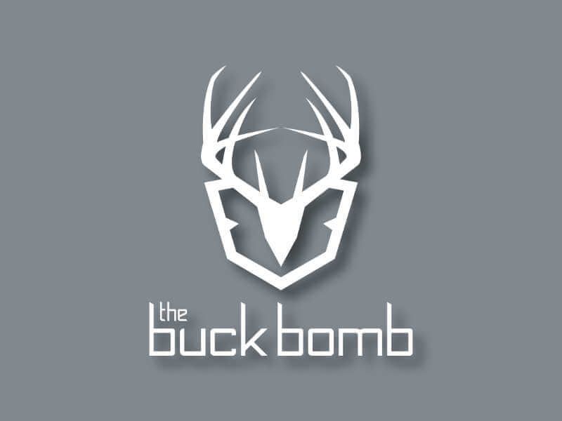 The Buck Bomb logo on grey background